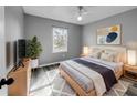 Cozy bedroom with light wood flooring and a large window at 3201 S Dorchester Dr, Deltona, FL 32738