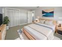 Spacious bedroom with light walls and built in closet at 1319 N Old Mill Dr, Deltona, FL 32725