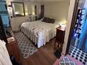 Spacious primary bedroom with a king-size bed at 1960 Pinewood Ln, Mount Dora, FL 32757