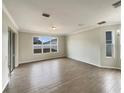 Bright dining room with wood-look tile flooring at 4047 Sw 51St Ct, Ocala, FL 34474