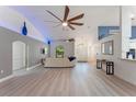 Spacious living area with vaulted ceilings and neutral color palette at 4938 Raylene Way, St Cloud, FL 34771