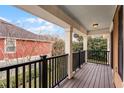 Private balcony with composite decking and black railings at 1267 Marley Ln, Winter Springs, FL 32708