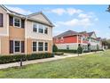 Townhome community showcasing two-story buildings with various siding colors at 1267 Marley Ln, Winter Springs, FL 32708