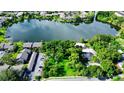 Aerial view showcasing lakefront property and surrounding area at 646 Jasmine Rd, Altamonte Springs, FL 32701