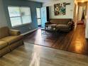 Bright living room featuring hardwood floors and a comfy couch at 807 Richbee Dr, Altamonte Springs, FL 32714