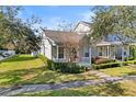 House exterior showcasing a side yard with lush green grass at 14624 Clarkson Dr, Orlando, FL 32828