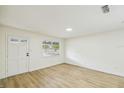 Bright and airy living room with light flooring at 5216 Bonnie Brae Cir, Orlando, FL 32808