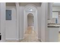 Bright and airy foyer with arched hallways leading to other rooms at 911 N Orange Ave # 214, Orlando, FL 32801