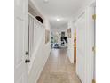 Bright entryway with tiled floor and staircase at 1209 W 6Th St, Sanford, FL 32771