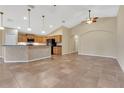 Spacious kitchen with island and modern appliances at 140 Gladesdown Ct, Deland, FL 32724