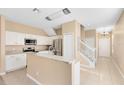 Kitchen with granite countertops and stainless steel appliances at 1407 Retreat Cir, Clermont, FL 34714