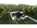 Aerial view of the home showing a back patio and perimeter fencing at 1700 Underwood Ave, St Cloud, FL 34771