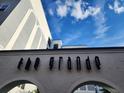 The Grande building signage with arched entryway at 202 E South St # 1050, Orlando, FL 32801