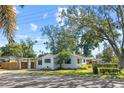 Ranch style home with carport and fenced backyard at 2501 Center Ave, Orlando, FL 32806