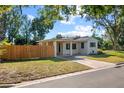 Mid-century modern home with a wooden fence at 2501 Center Ave, Orlando, FL 32806