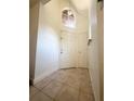 Bright and airy entryway with tile flooring and high ceilings at 429 Fountainhead Cir # 122, Kissimmee, FL 34741