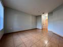 Spacious bedroom with tile floors and neutral walls at 4865 Cypress Woods Dr # 2109, Orlando, FL 32811