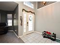 Bright entryway with tile flooring and access to living areas at 1076 Country Cove Ct, Oviedo, FL 32766