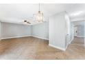 Bright living room with tile floors and a ceiling fan at 131 Bristol Forest Trl, Sanford, FL 32771