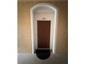 Condo front door entrance with doormat at 6100 Stevenson Dr # 105, Orlando, FL 32835