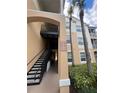 Stairwell entrance to condo building with unit numbers at 6100 Stevenson Dr # 105, Orlando, FL 32835