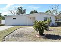 Newly built home featuring a landscaped yard and modern design at 660 Encino Way, Altamonte Springs, FL 32714