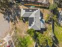 Overhead view of a house with solar panels on the roof at 1950 Baton Rouge Ct, Orlando, FL 32818