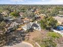 Aerial view showcasing the house and surrounding homes at 1950 Baton Rouge Ct, Orlando, FL 32818