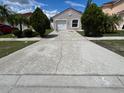 Large driveway with enough space for multiple vehicles at 2317 Santa Lucia St, Kissimmee, FL 34743
