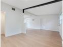 Bright and airy living room featuring light wood floors and an open floor plan at 2913 W Amelia St, Orlando, FL 32805