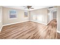 Spacious bedroom with hardwood floors and ample natural light at 2569 Belmont Ave, New Smyrna Beach, FL 32168