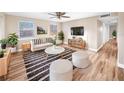 Bright living room featuring hardwood floors and modern decor at 2569 Belmont Ave, New Smyrna Beach, FL 32168