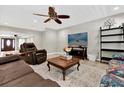 Comfortable living room with a ceiling fan and tile flooring throughout at 3334 N Westmoreland Dr, Orlando, FL 32804