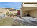 Condo entrance with covered carport and landscaping at 109 Madrid Dr # 109, Casselberry, FL 32707