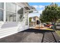 Deck overlooking the community with a metal railing at 50989 Highway 27 # 25, Davenport, FL 33897