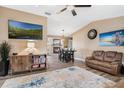 Spacious living area with a fireplace and large flat-screen TV at 798 Saint Johns River Dr, Sanford, FL 32773