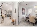 Bright dining area with a table for six and an open feel at 960 Ladera Ranch Rd, Poinciana, FL 34759