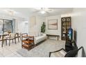 Bright living room features a comfy sofa, dining area, and stylish decor at 1120 Portland Ave # 4, Orlando, FL 32803