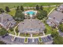 Luxury condo community with resort-style pool and golf course views at 7609 Heritage Crossing Way # 201, Reunion, FL 34747