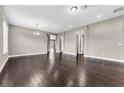 Dining room with hardwood floors and access to kitchen and hallway at 16672 Broadwater Ave, Winter Garden, FL 34787