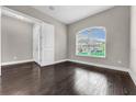 Bright room with hardwood floors and view to the front yard at 16672 Broadwater Ave, Winter Garden, FL 34787