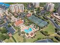 Community features tennis courts, pool, and clubhouse at 263 Minorca Beach Way # 301, New Smyrna Beach, FL 32169