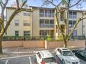 Two-story building exterior with parking in front at 629 Dory Ln # 108, Altamonte Springs, FL 32714