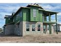 A house under construction with Zip System sheathing visible at 9803 Ballast Dr, Orlando, FL 32827