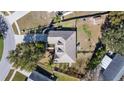 Aerial view showcasing the home's layout and surrounding landscape at 1921 Nicholas Pl, St Cloud, FL 34771