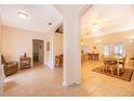 Open-concept foyer featuring tile flooring and archways leading to dining and living areas at 1101 James Ave, Deltona, FL 32738