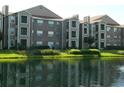 Apartment building by the lake at 5545 Devonbriar Way # 205, Orlando, FL 32822