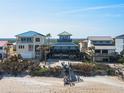 Beachfront property aerial view, showing the house and beach access at 6111 Turtlemound Rd, New Smyrna Beach, FL 32169