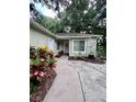 House exterior showcasing walkway and landscaping at 505 Harvard Pl, Apopka, FL 32703