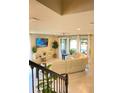 Spacious living room with large sectional sofa and plenty of natural light at 1100 Pavia Dr, Apopka, FL 32703